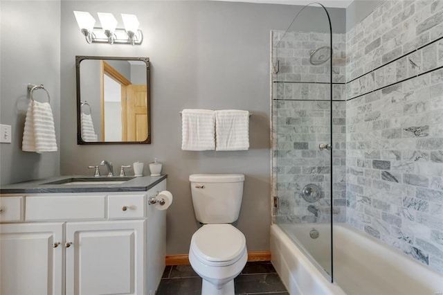 full bathroom featuring tile patterned flooring, toilet, a skylight, vanity, and tiled shower / bath combo