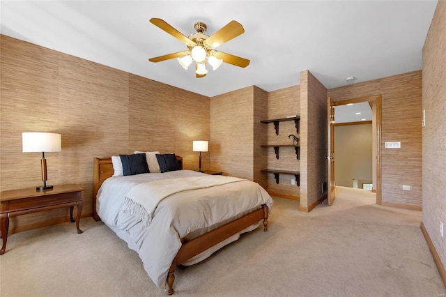 bedroom featuring light colored carpet and ceiling fan