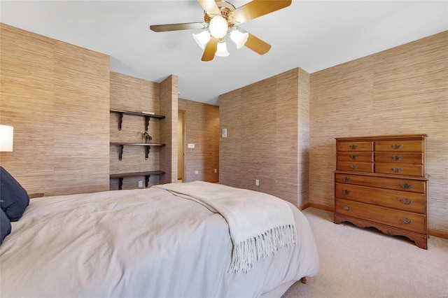 bedroom featuring ceiling fan and light colored carpet