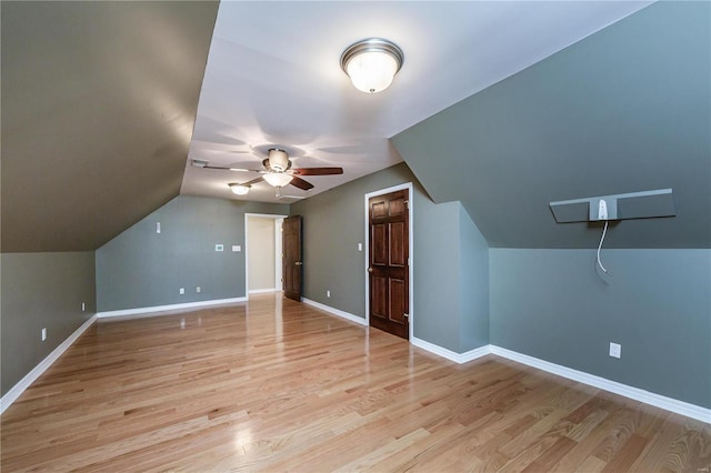 bonus room featuring ceiling fan, lofted ceiling, and light hardwood / wood-style flooring