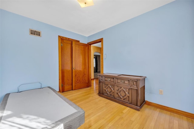 bedroom featuring light hardwood / wood-style floors