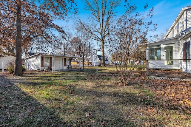 view of yard with a sunroom