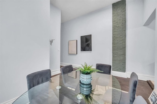 dining area featuring wood-type flooring