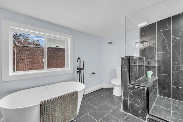 bathroom featuring toilet and shower with separate bathtub