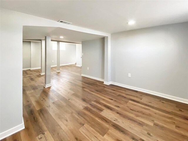 basement with wood-type flooring