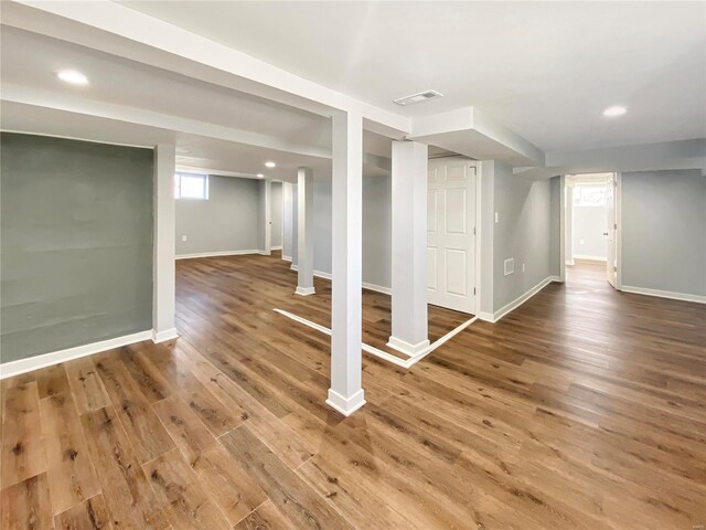 basement featuring wood-type flooring