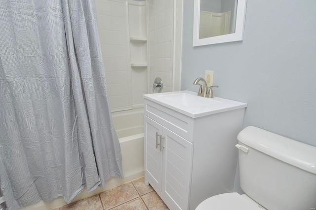 full bathroom with tile patterned floors, shower / tub combo with curtain, vanity, and toilet