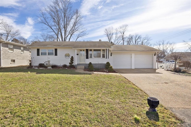 ranch-style house with a garage and a front lawn