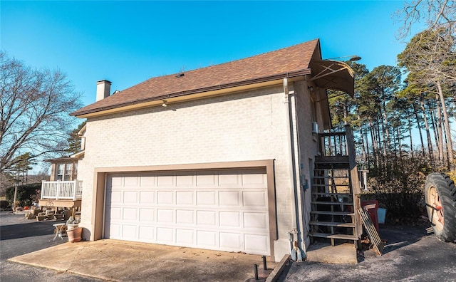 view of property exterior featuring a garage