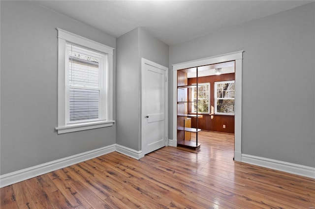 empty room featuring wood-type flooring