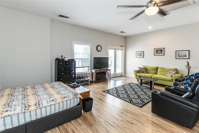 bedroom featuring ceiling fan and light hardwood / wood-style floors