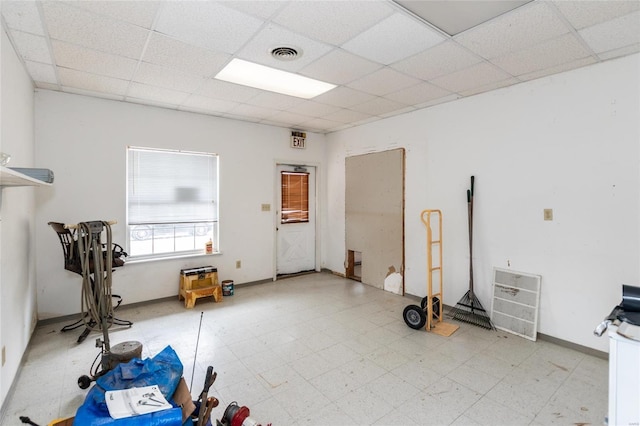 miscellaneous room featuring a paneled ceiling