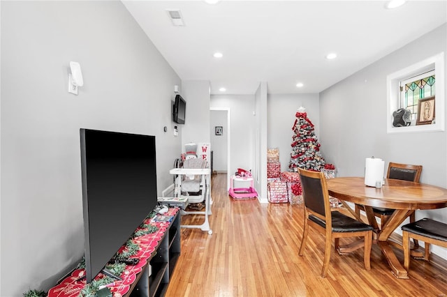 playroom with light hardwood / wood-style floors