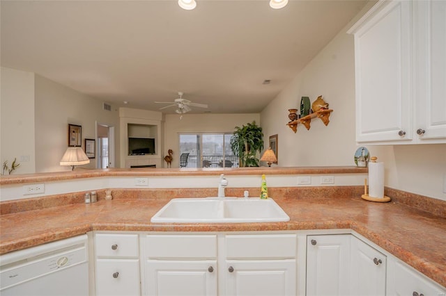 kitchen with white cabinetry, ceiling fan, sink, and dishwasher