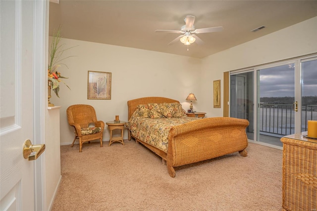 carpeted bedroom with access to outside and ceiling fan