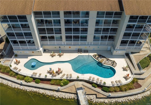 view of swimming pool with a water view