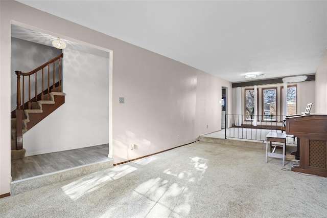 unfurnished living room with carpet