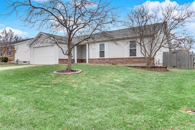 ranch-style home featuring a garage and a front yard