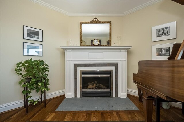 interior details featuring ornamental molding and hardwood / wood-style flooring