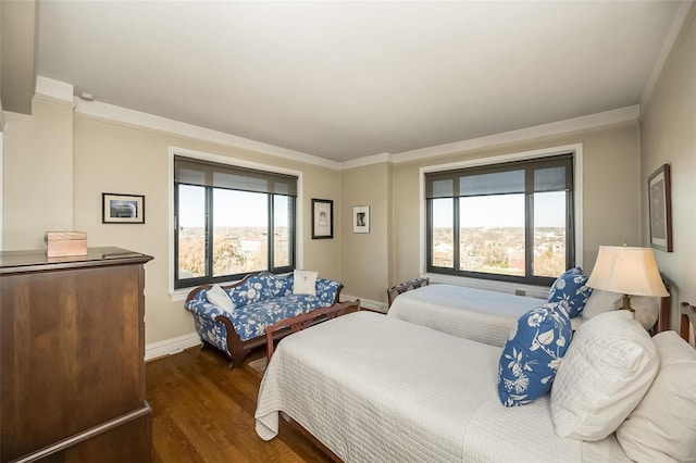 bedroom featuring dark hardwood / wood-style floors, multiple windows, and ornamental molding