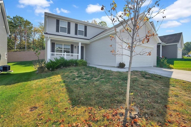 front of property featuring a front yard, a porch, central AC, and a garage