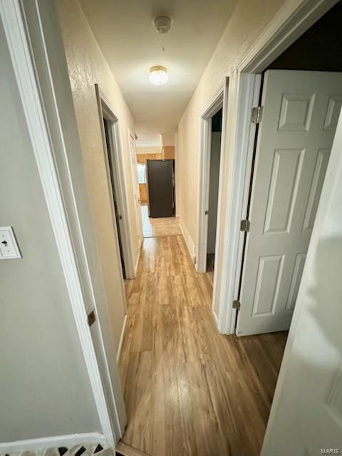 hall featuring light hardwood / wood-style floors