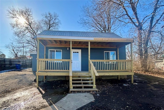 view of front of home featuring covered porch