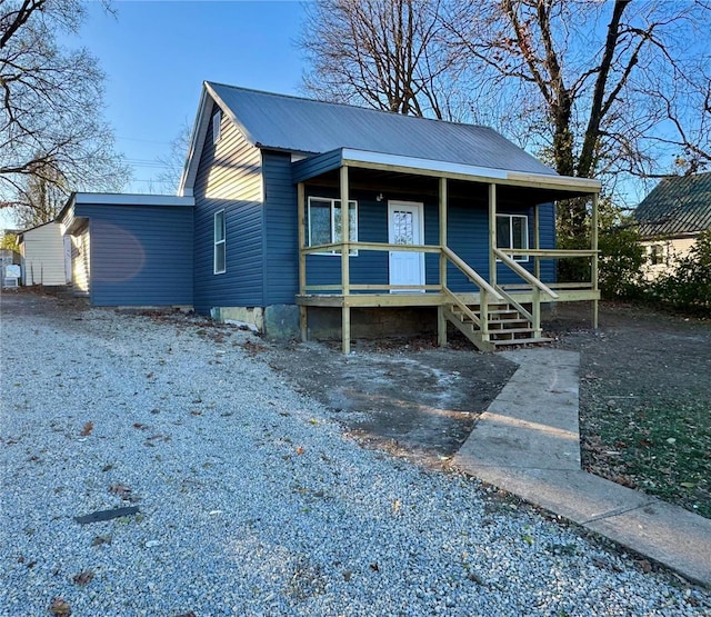 view of front of home featuring covered porch