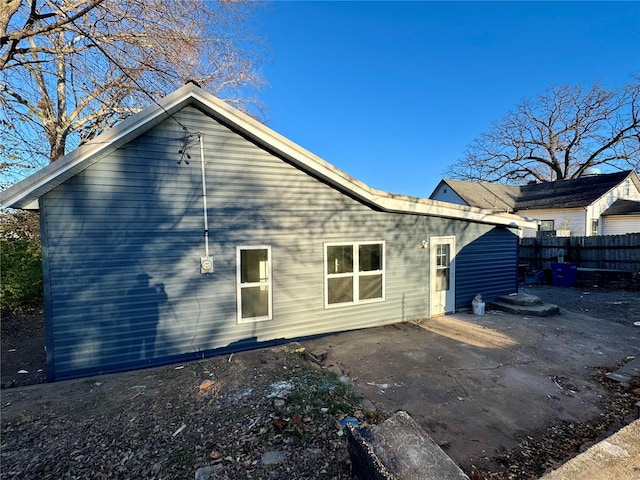 back of house with a patio