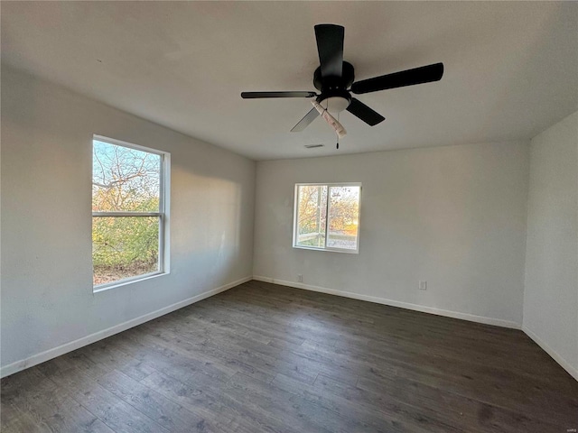 unfurnished room featuring dark hardwood / wood-style flooring