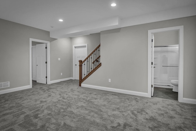 interior space with dark carpet