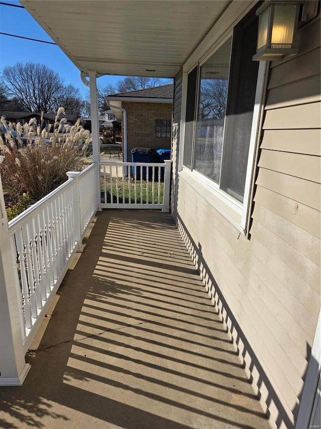 balcony featuring a porch