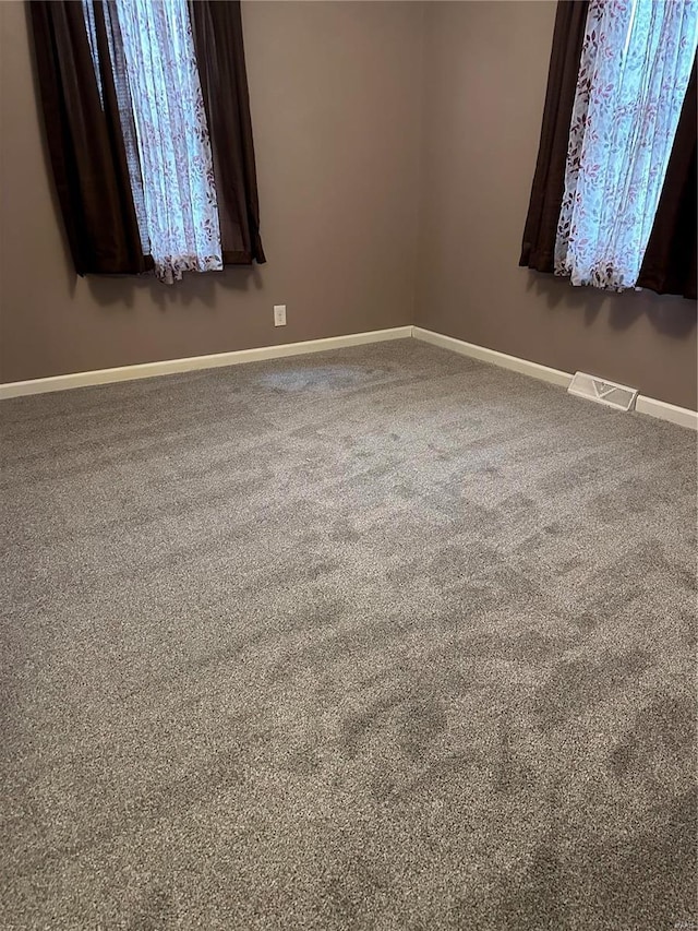 view of carpeted spare room