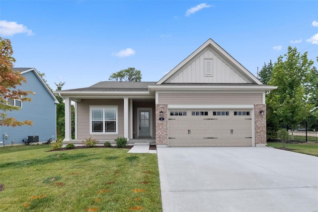 view of front of house featuring a garage and a front yard