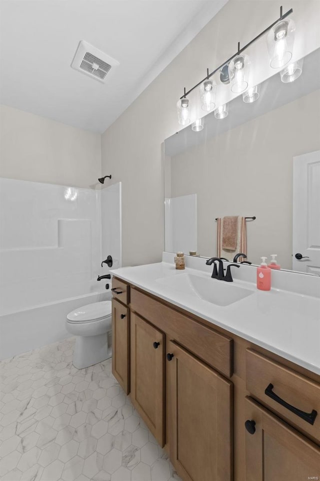 full bathroom with vanity, toilet, and shower / bath combination