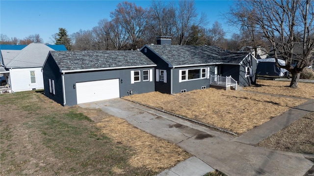 ranch-style home with a garage