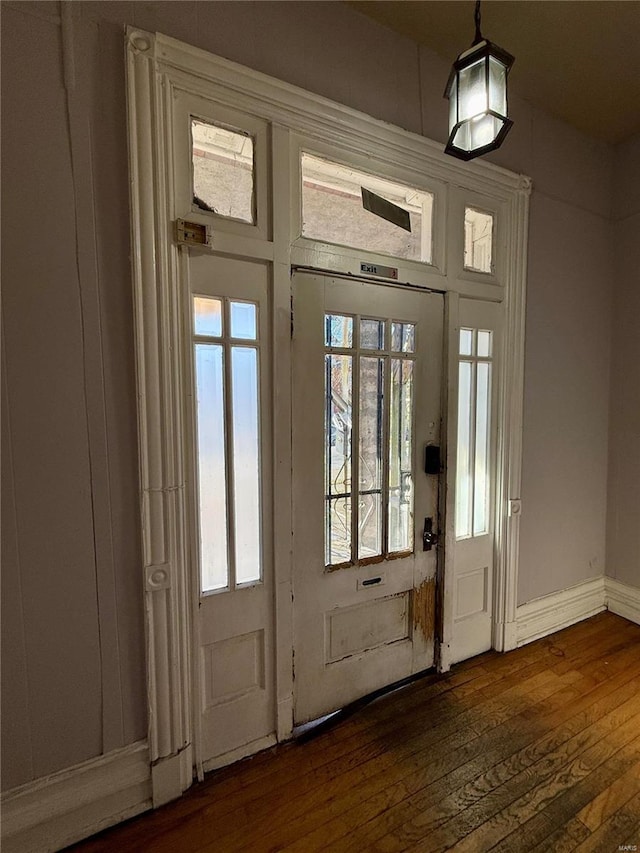 doorway featuring dark wood-type flooring