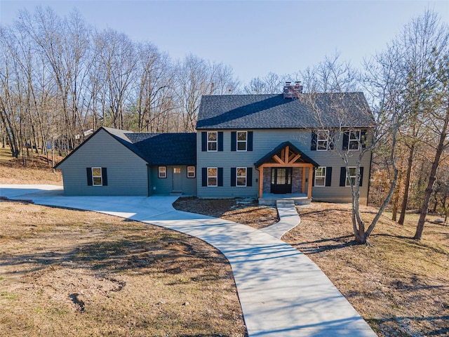 colonial inspired home with covered porch