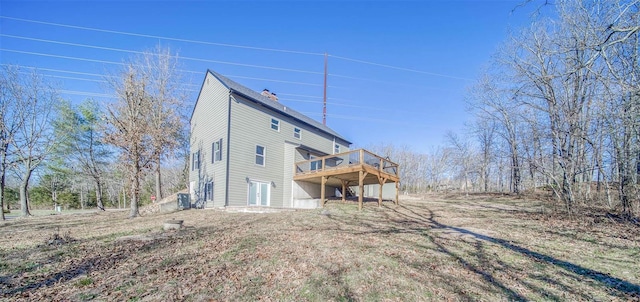 rear view of house with a deck