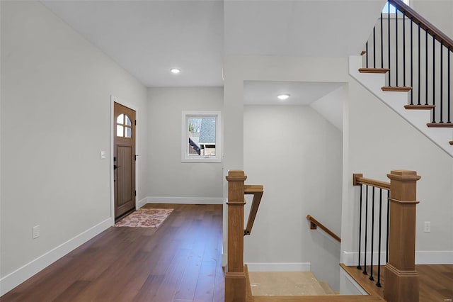 foyer entrance featuring dark hardwood / wood-style floors