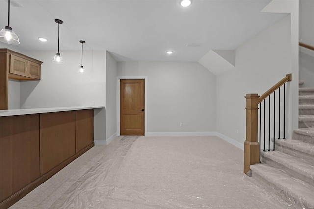 interior space featuring light colored carpet