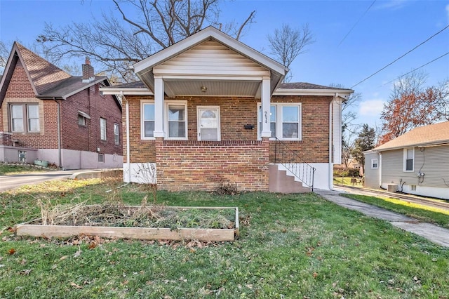 bungalow with a front yard