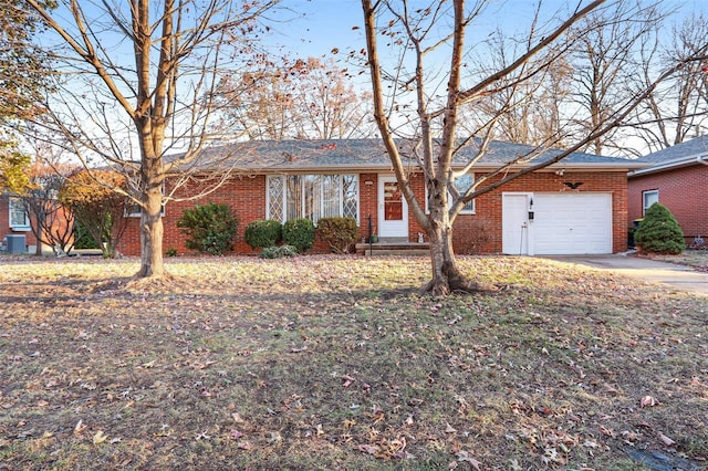 single story home featuring a garage