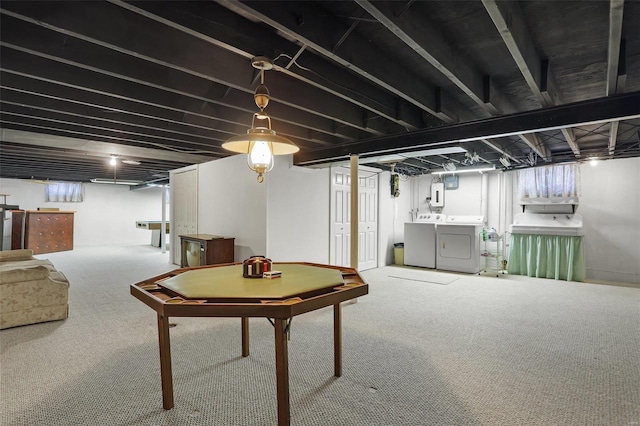 basement featuring carpet and washing machine and dryer