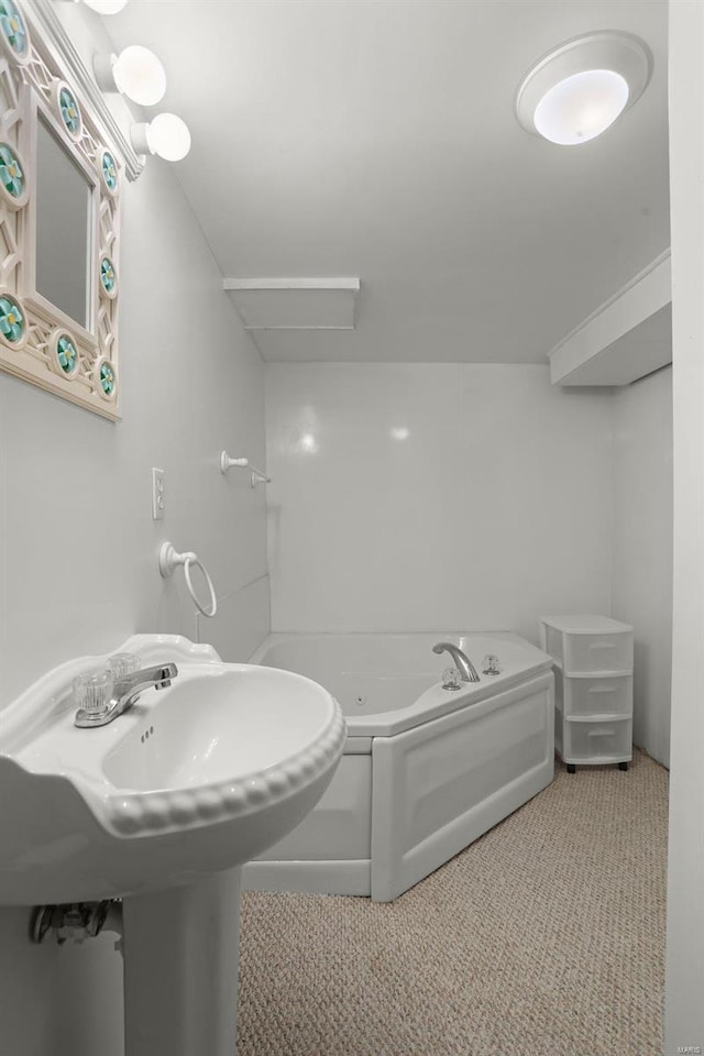 bathroom featuring a tub to relax in