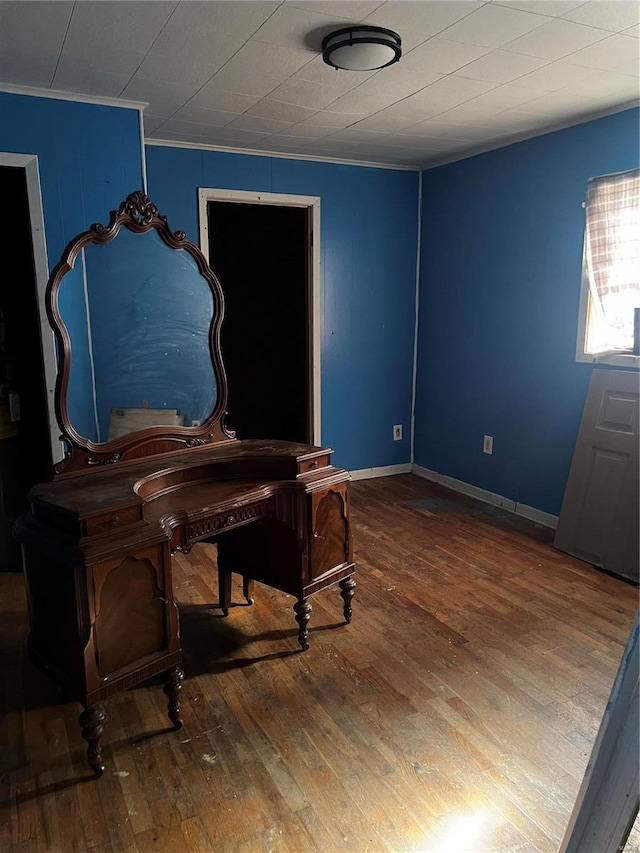 misc room with ornamental molding and hardwood / wood-style flooring