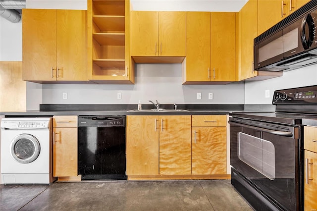 kitchen featuring washer / dryer, sink, and black appliances