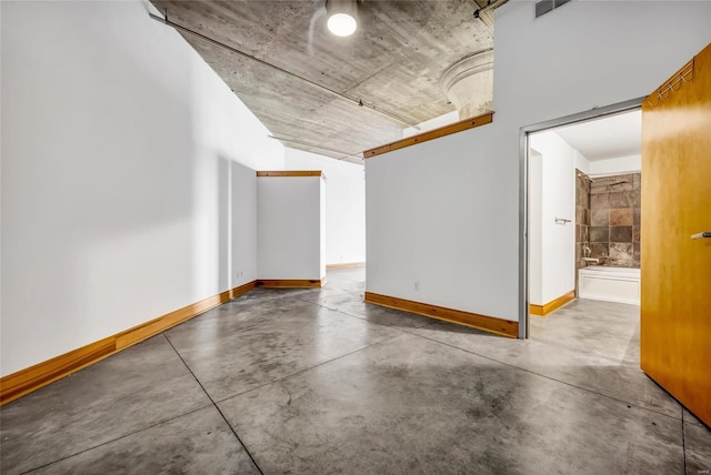 empty room featuring concrete floors