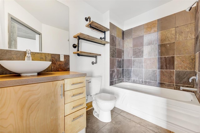 full bathroom featuring tile patterned flooring, vanity, shower / bath combination, and toilet