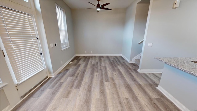 interior space featuring ceiling fan and light hardwood / wood-style floors